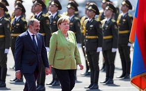 Merkel’s Trip to a Divided Region